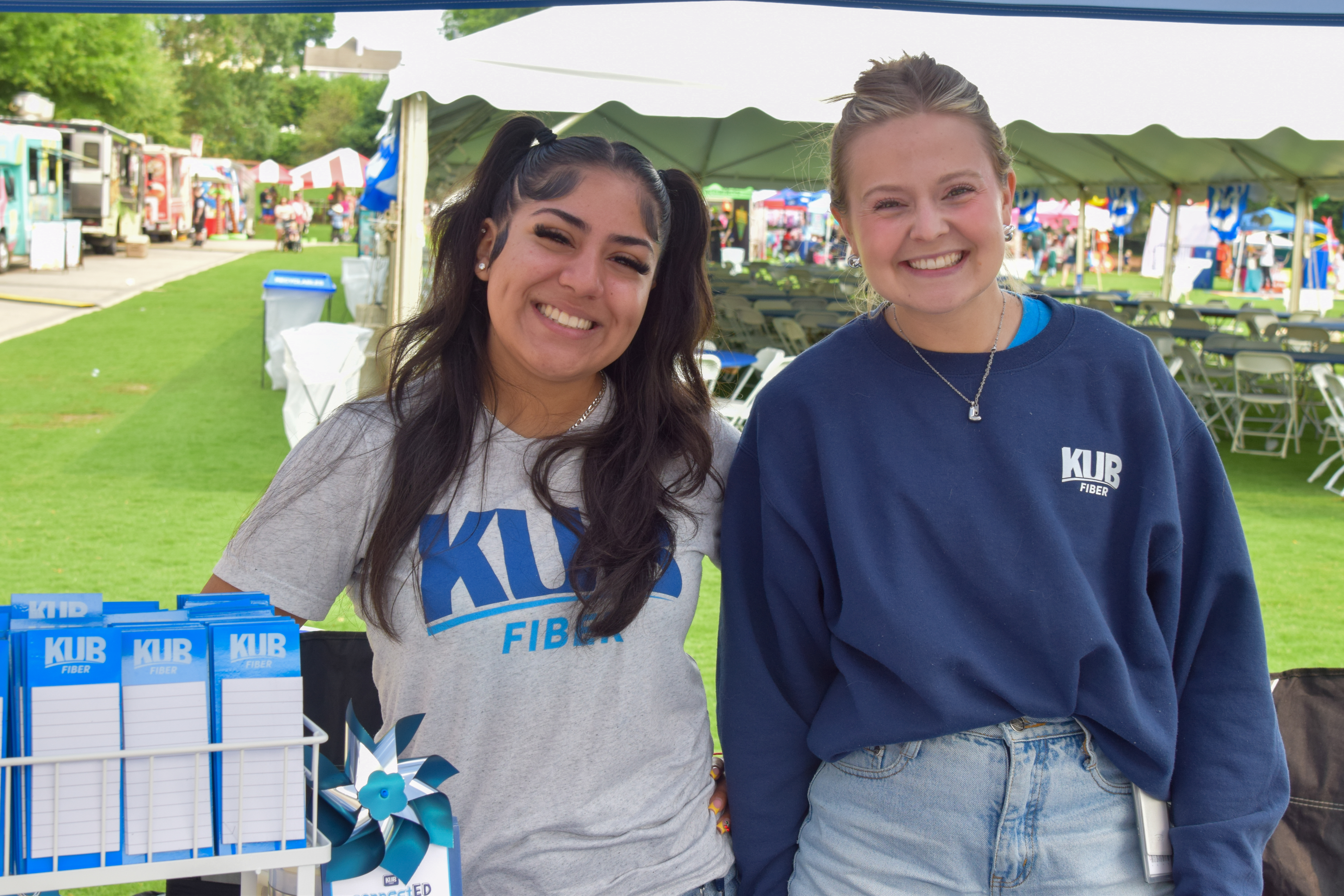 two KUB team members at a community event ready to talk about KUB Fiber internet